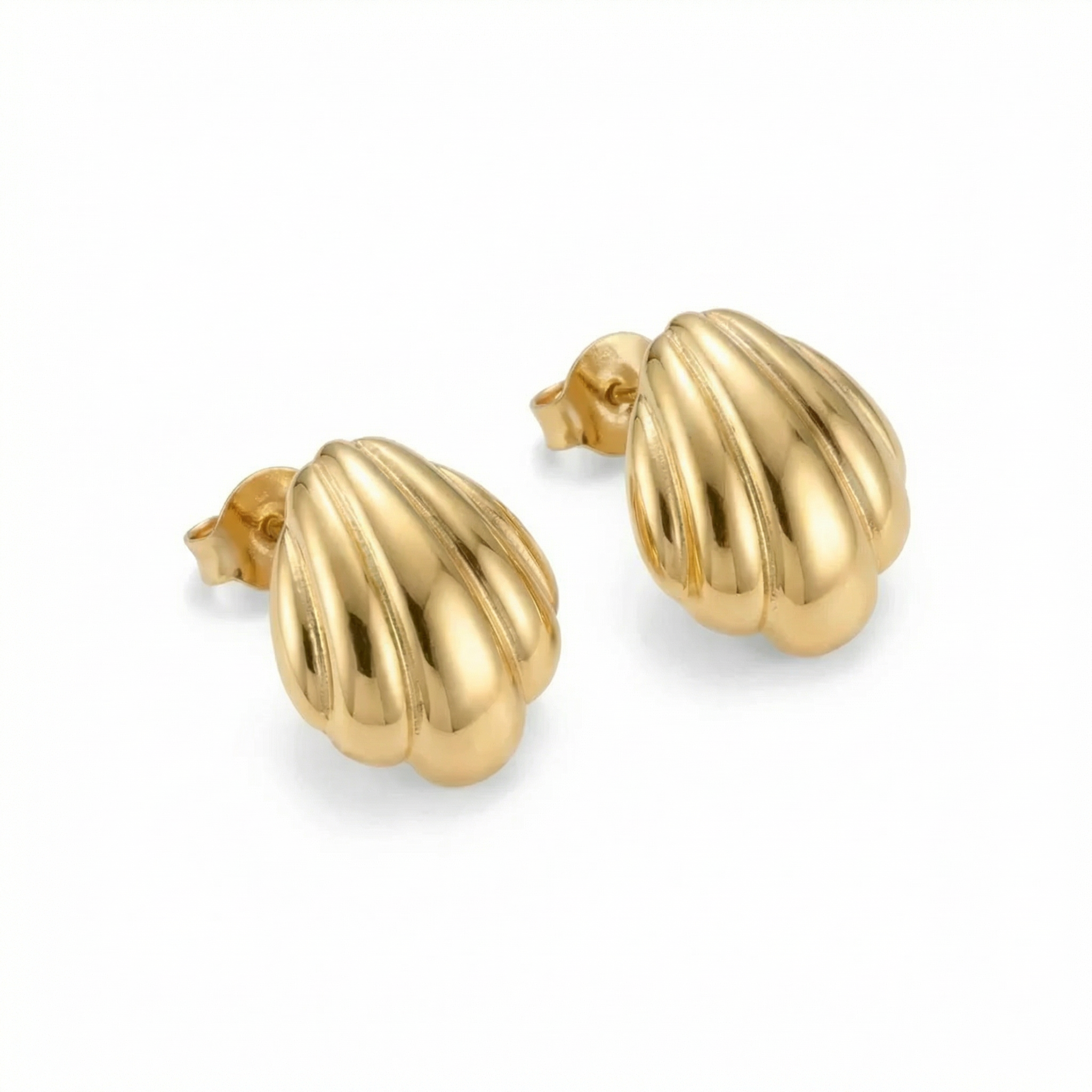 Gold shell-shaped earrings on a white background