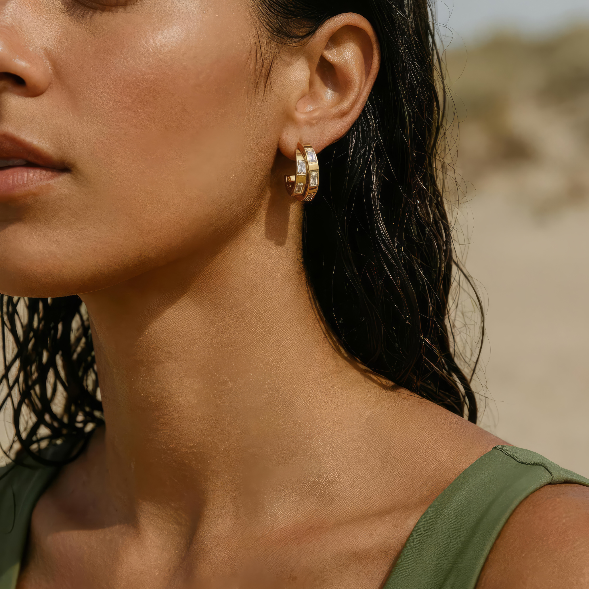 Gold hoop earrings on a woman 