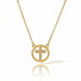 Gold necklace with a cross pendant on a white background