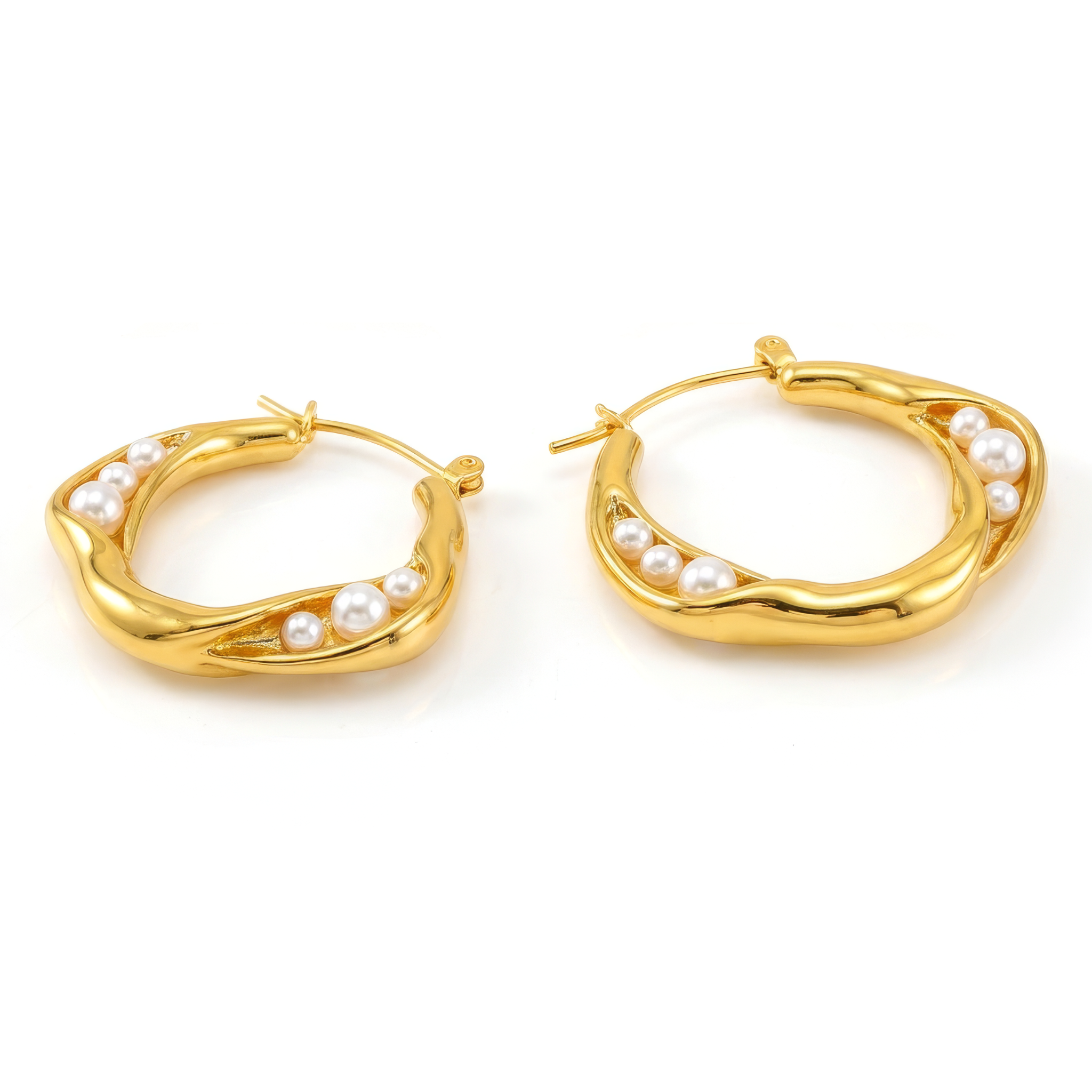 Gold hoop earrings with pearl accents on a white background