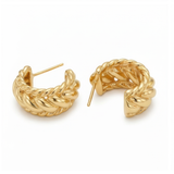 Pair of gold hoop earrings on a white background
