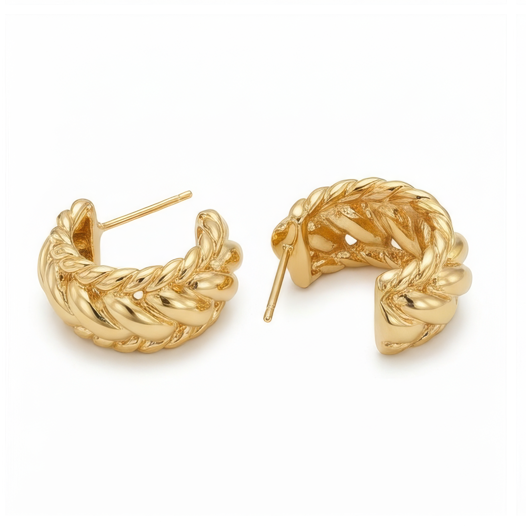 Pair of gold hoop earrings on a white background