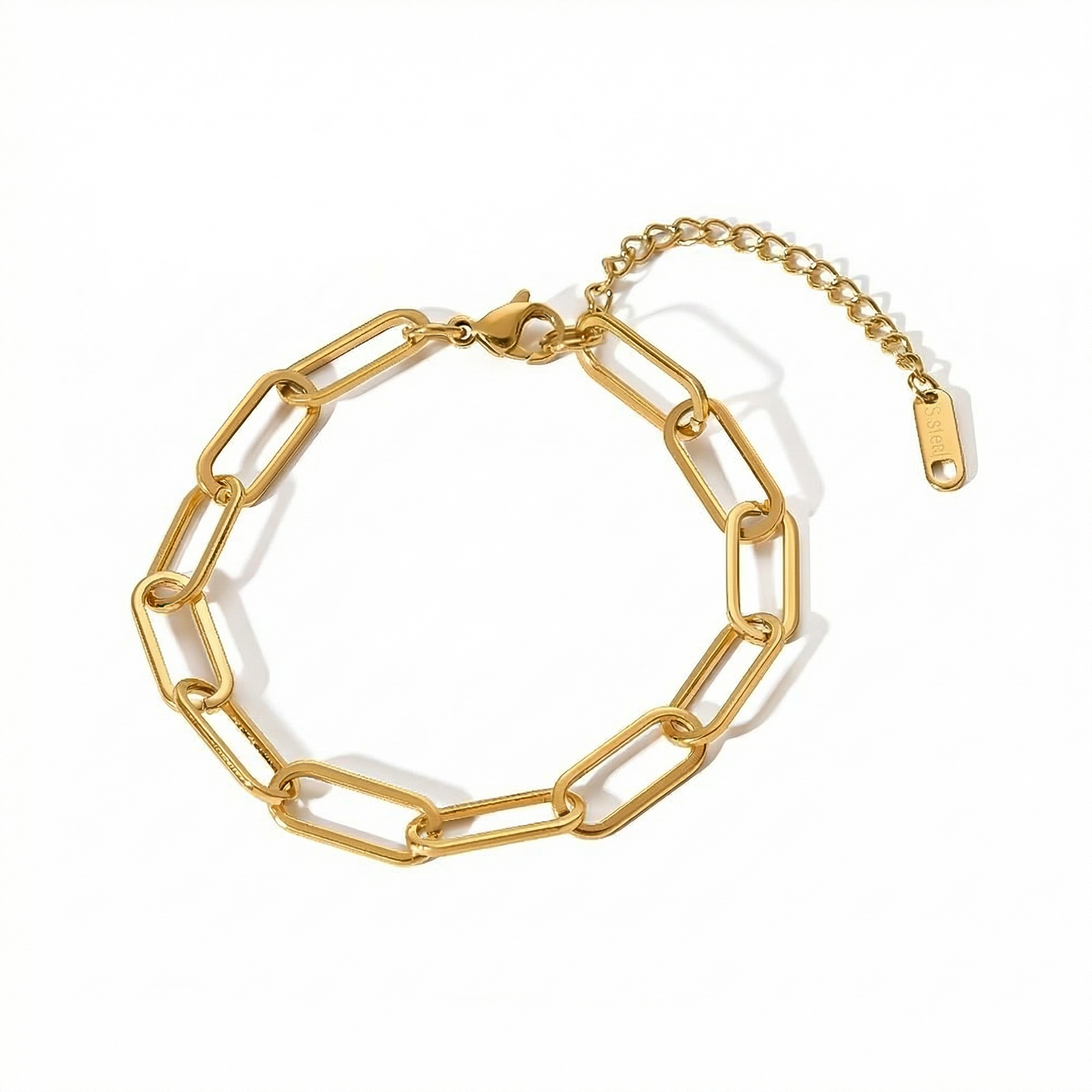 Gold paperclip chain bracelet on a white background